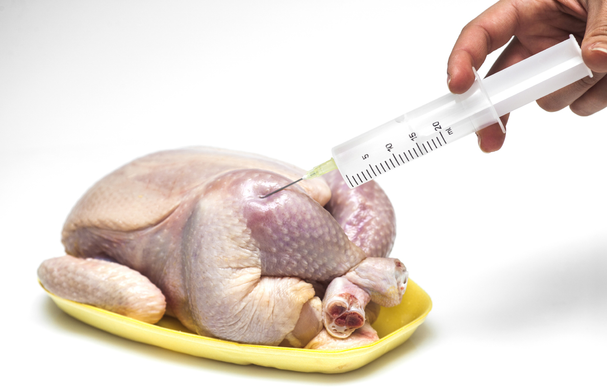 The Chickens Are Injected With A Saline Solution From 15 Secrets Of The   11 Chicken Injected Shutterstock Edit 